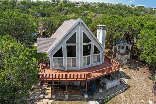 a view of a house with a roof deck
