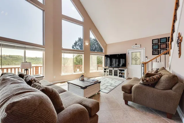a view of a dining room with furniture window and outside view