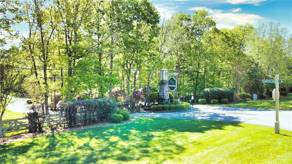568 Stewart Lane Rising Fawn, GA 30738 - Photo 2 of 6 a view of a backyard with tree s
