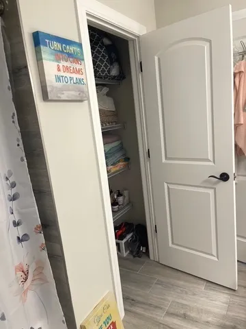 an entryway with a rug