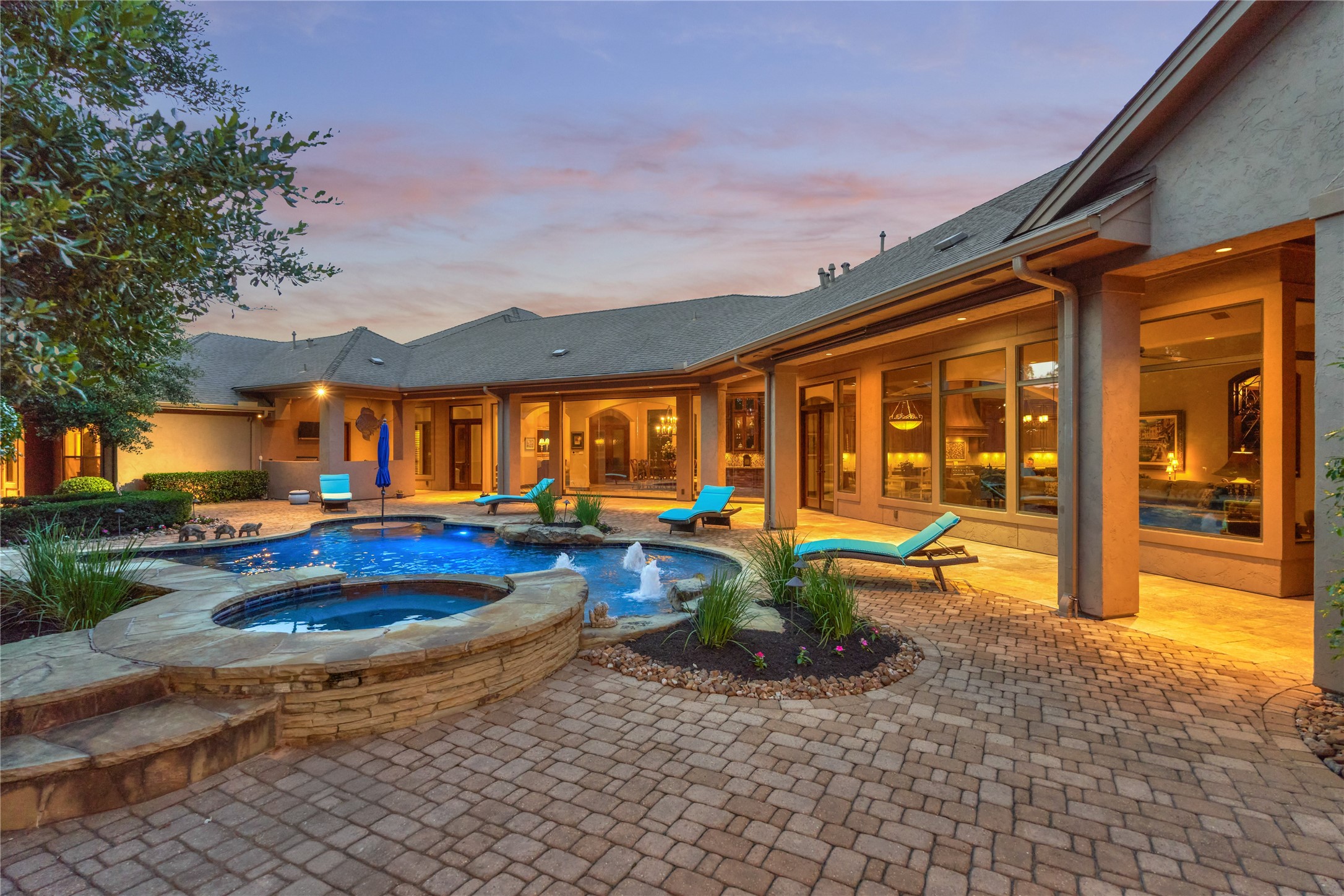 24803 Pearl Crest Lane Spring, TX 77389 - Photo 43 of 50 The saltwater pool & spa features high-efficiency pumps, two water features, LED lighting, an in-floor cleaning system, and a PebbleTec surface.