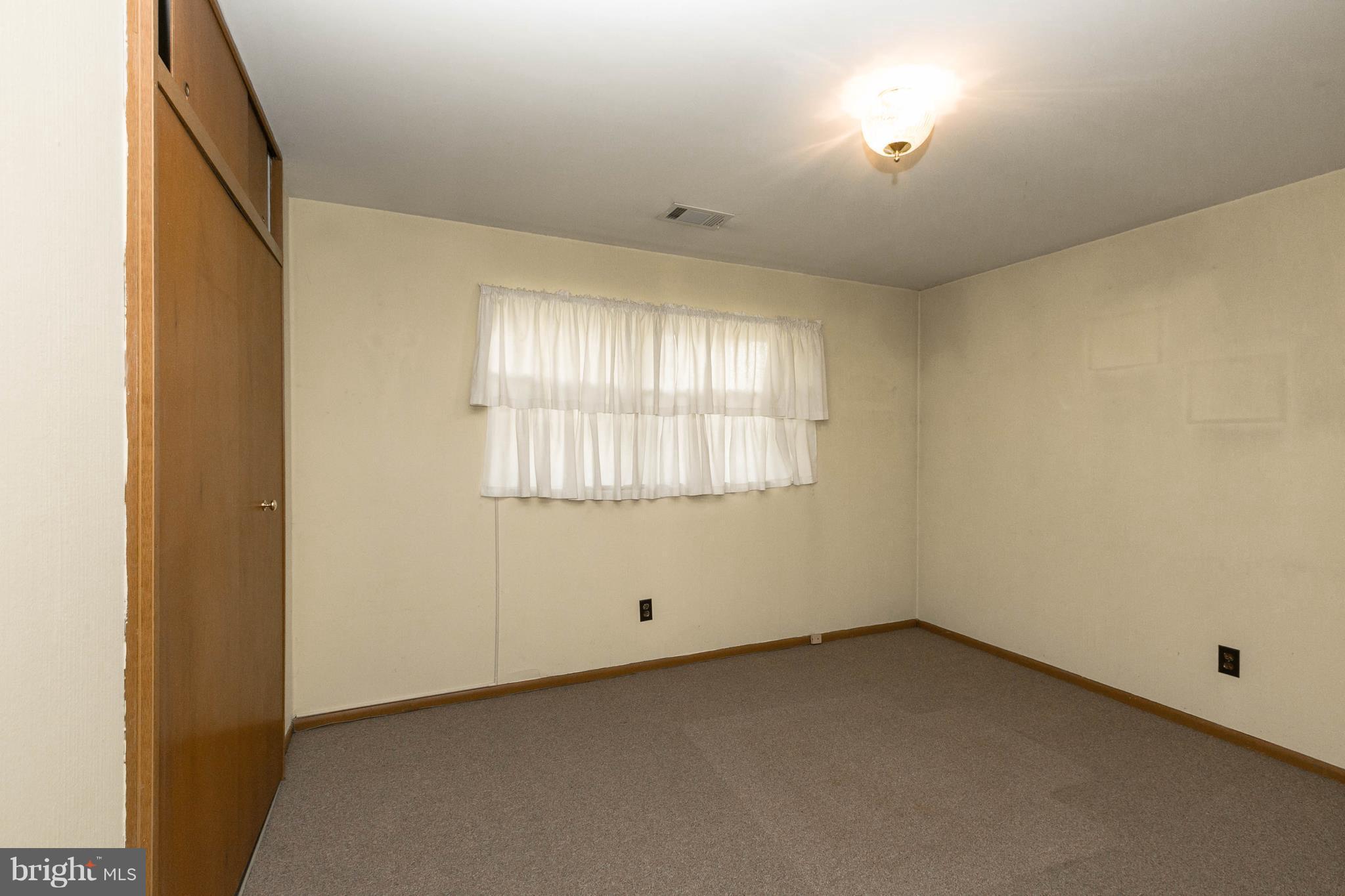 502 Bathurst Road Baltimore, MD 21228 - Photo 13 of 23 4th bedroom on LL with access to half bath