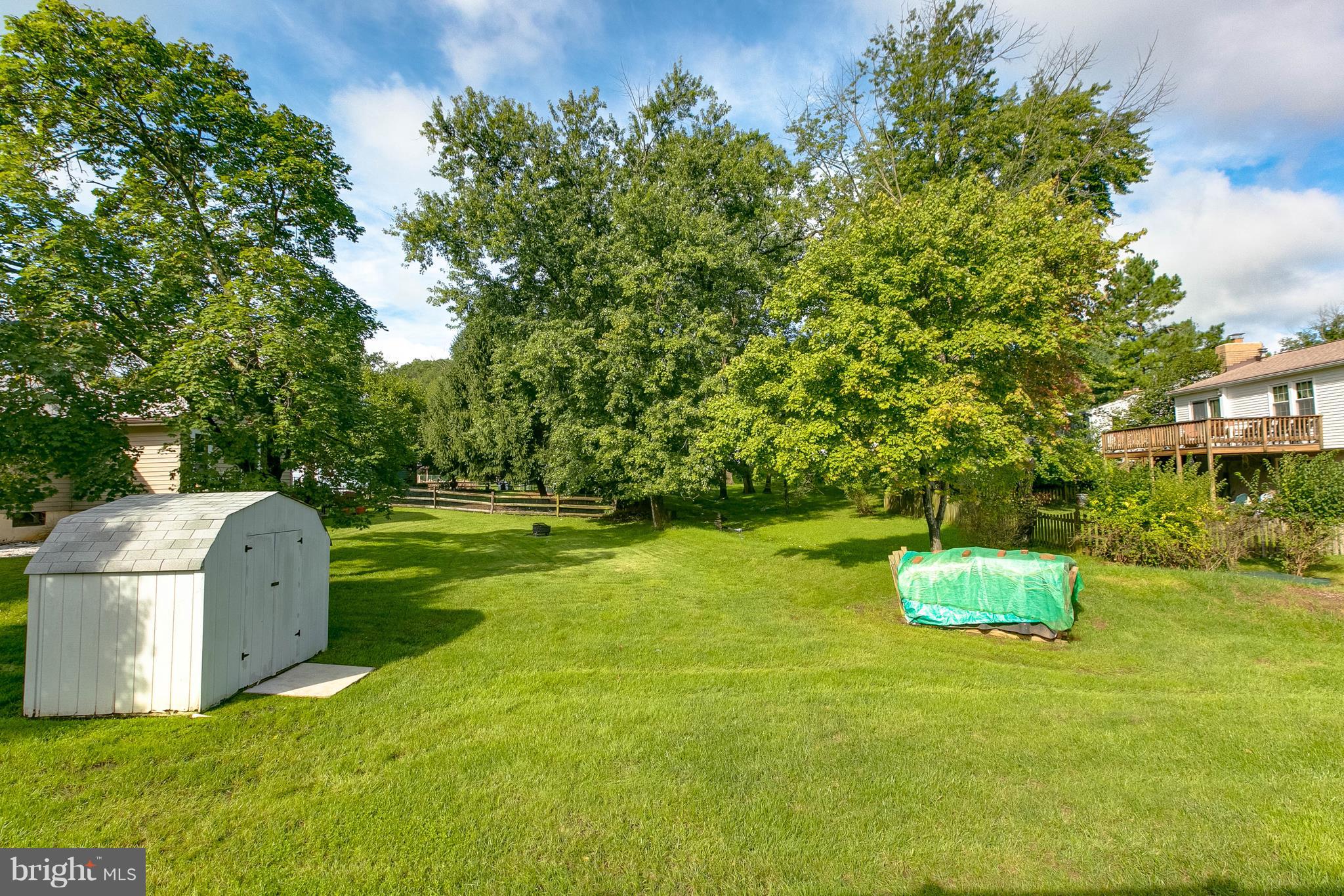 502 Bathurst Road Baltimore, MD 21228 - Photo 20 of 23 Nice back yard w/shed wood does NOT CONVEY