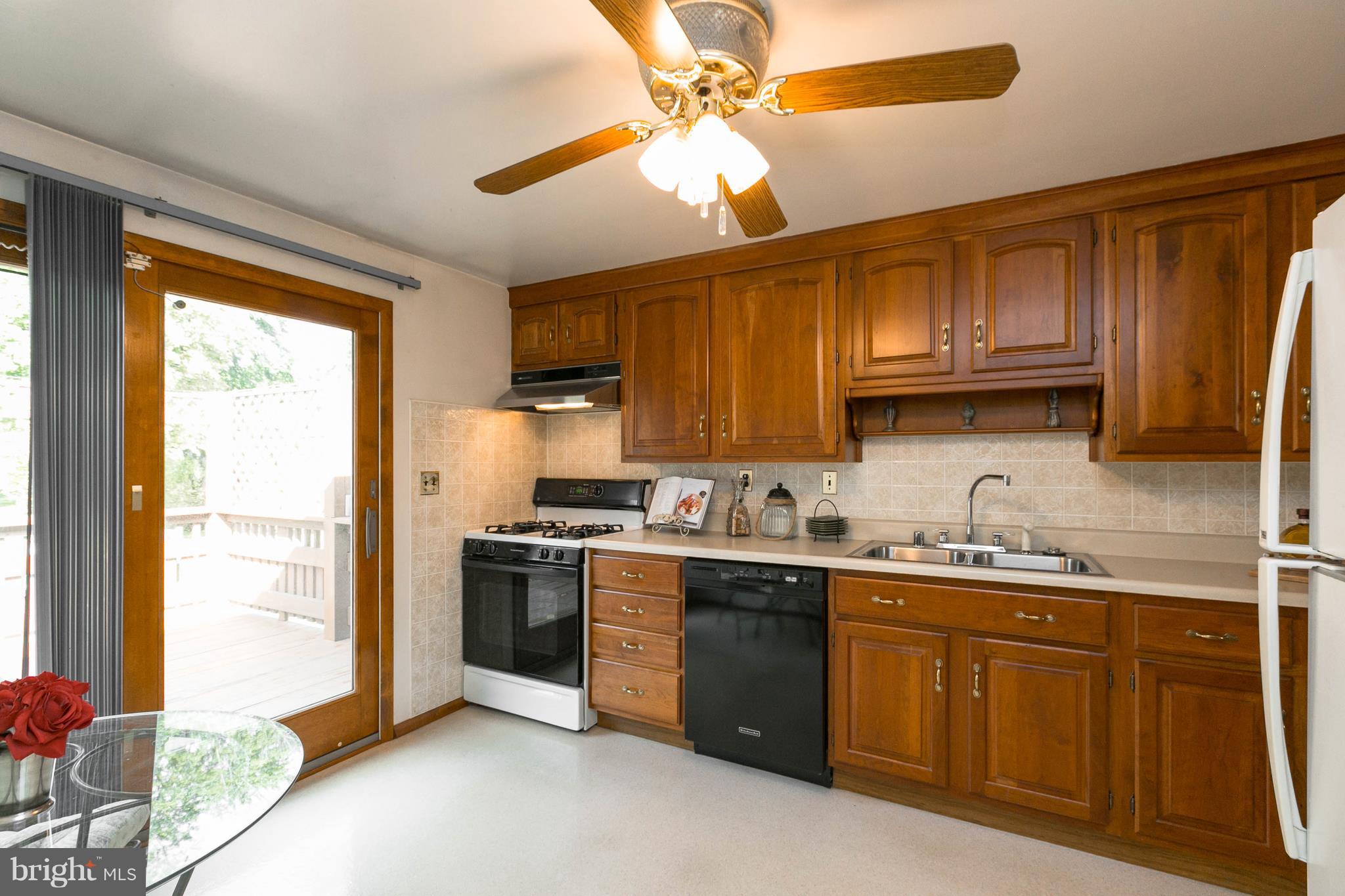 502 Bathurst Road Baltimore, MD 21228 - Photo 6 of 23 Kitchen w/ Anderson slider to deck