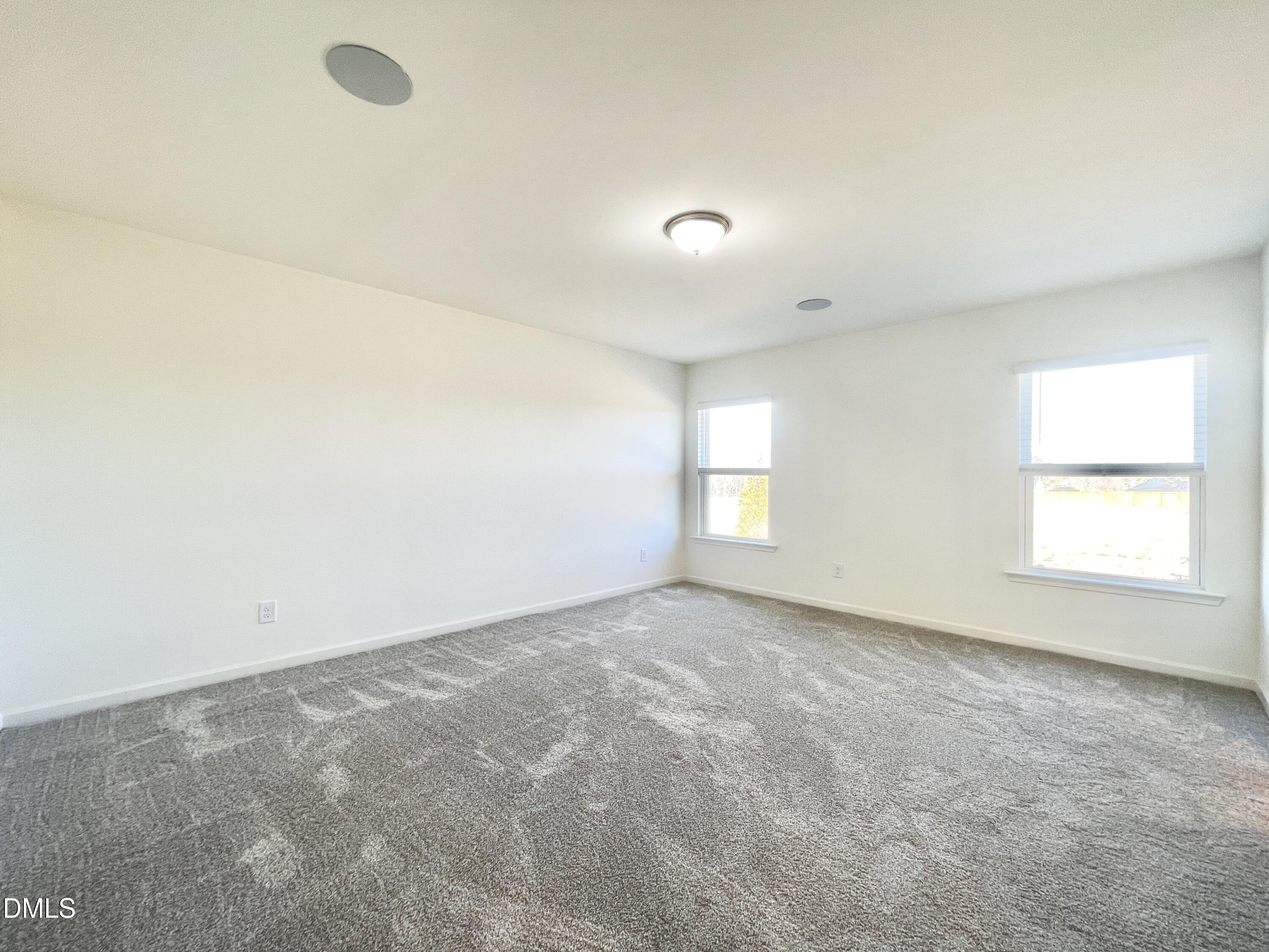 6117 Oak Psge Drive Raleigh, NC 27603 - Photo 13 of 25 an empty room with a window