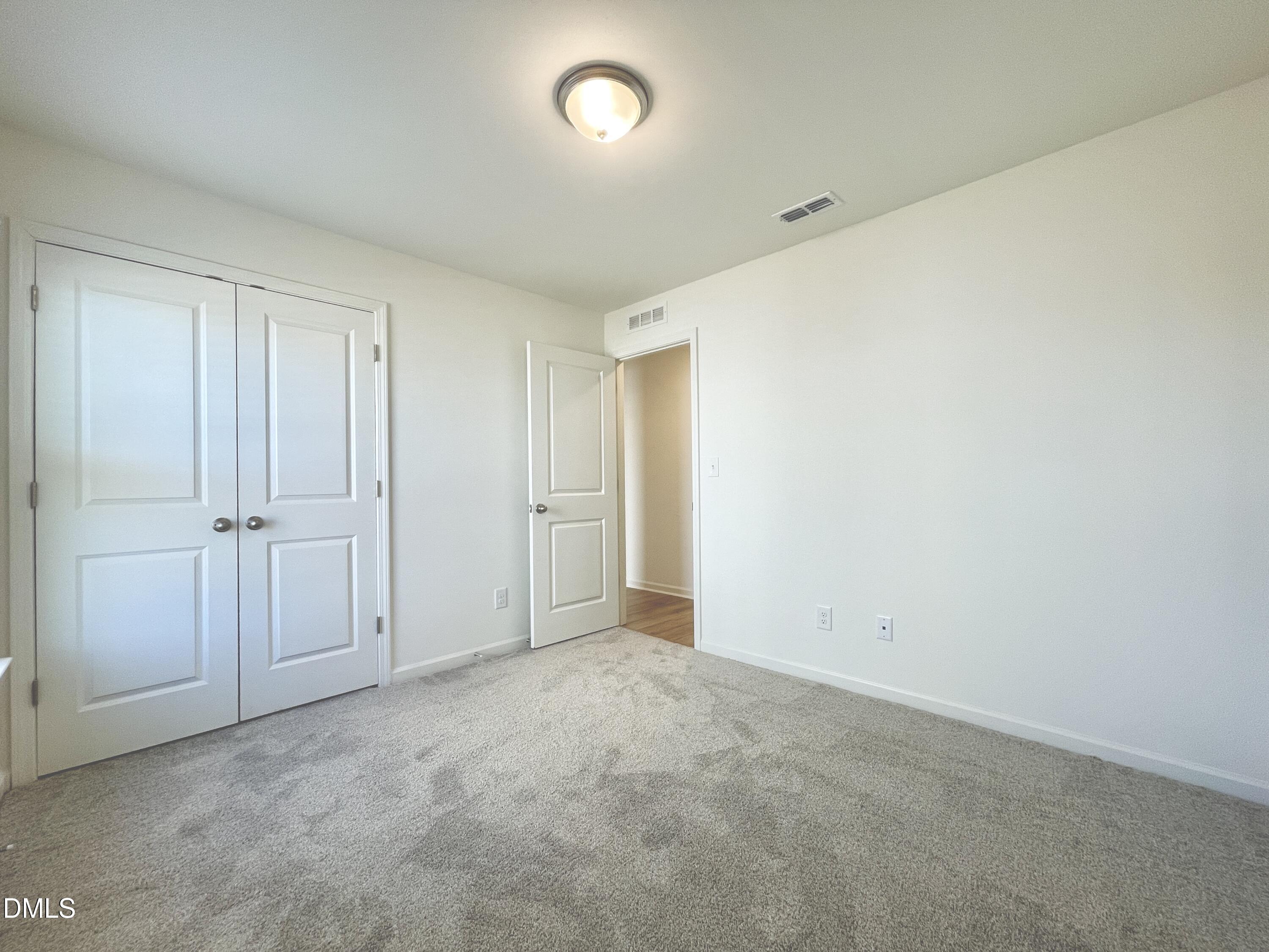 6117 Oak Psge Drive Raleigh, NC 27603 - Photo 18 of 25 a view of an empty room