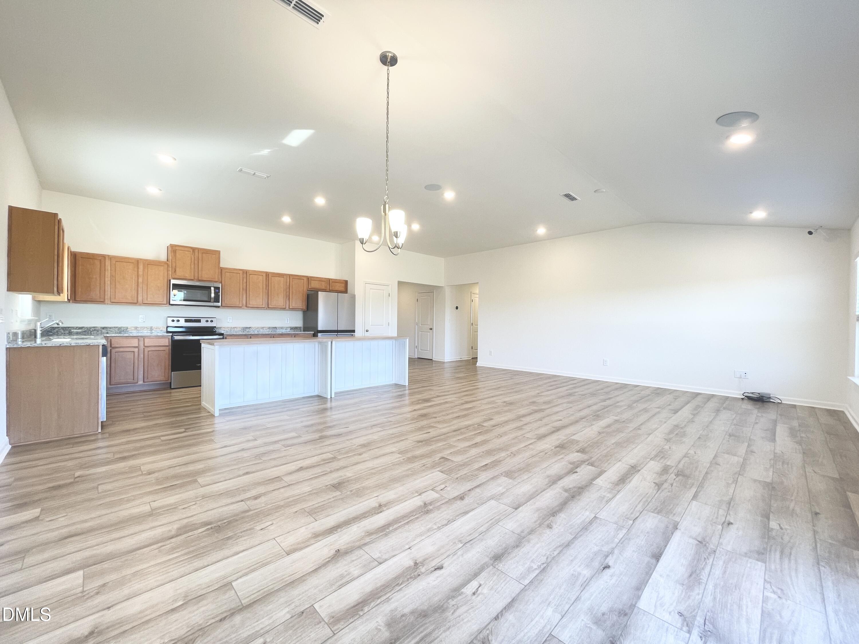 6117 Oak Psge Drive Raleigh, NC 27603 - Photo 6 of 25 a view of kitchen and kitchen with stainless steel appliances