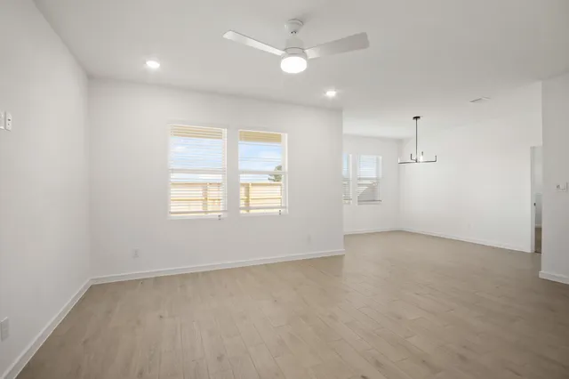 a view of a hallway with a room