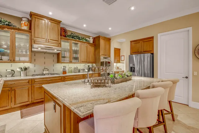 a view of a dining room with furniture and window