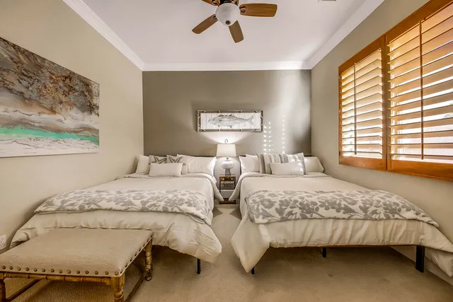 a view of an outdoor sitting area with furniture and umbrella