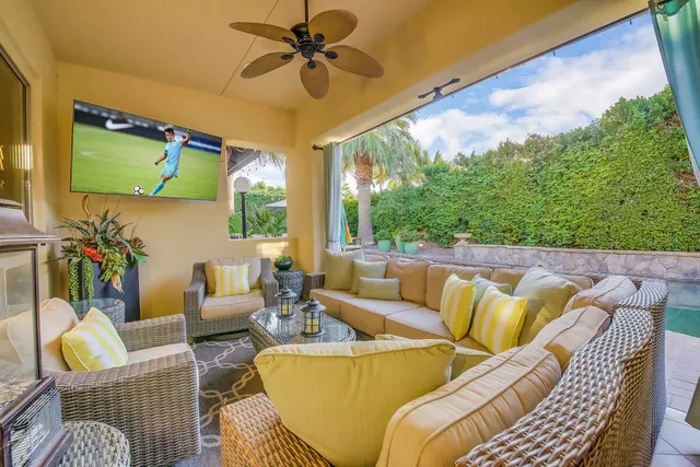 a view of a swimming pool with a patio