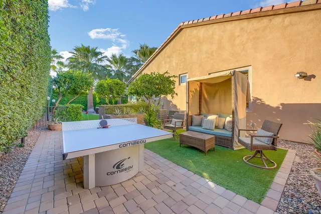 a view of a chairs in front of house