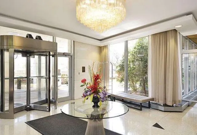 a room with gym equipment and a large window