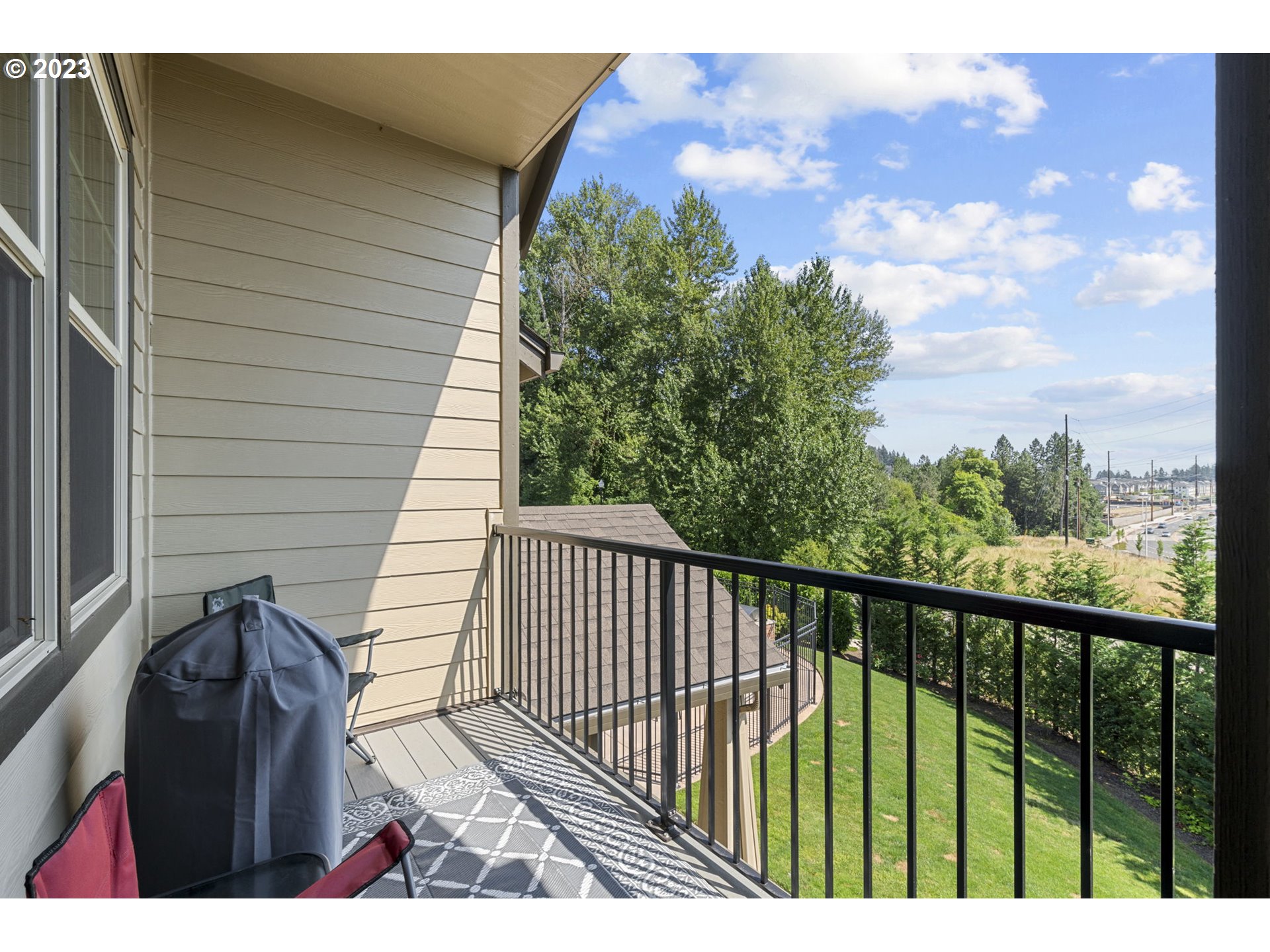 17051 Southwest Appledale Road, Unit 204 Beaverton, OR 97007 - Photo 20 of 23 a view of balcony with wooden floor