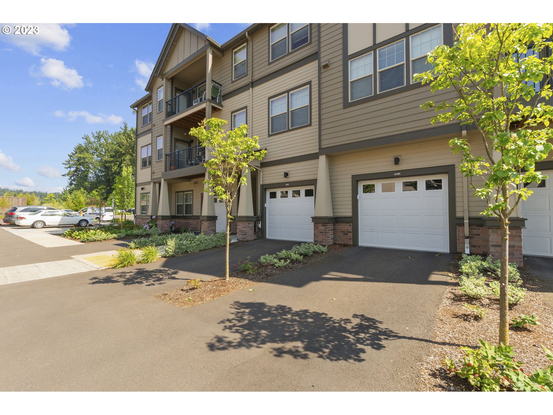 17051 Southwest Appledale Road, Unit 204 Beaverton, OR 97007 - Photo 23 of 23 a house view with a outdoor space