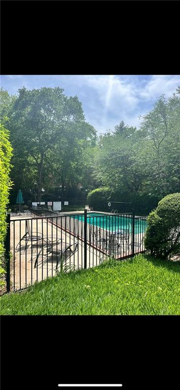 1381 Normandy Drive Northeast, Unit 2 Atlanta, GA 30306 - Photo 12 of 12 a view of a garden from a lake