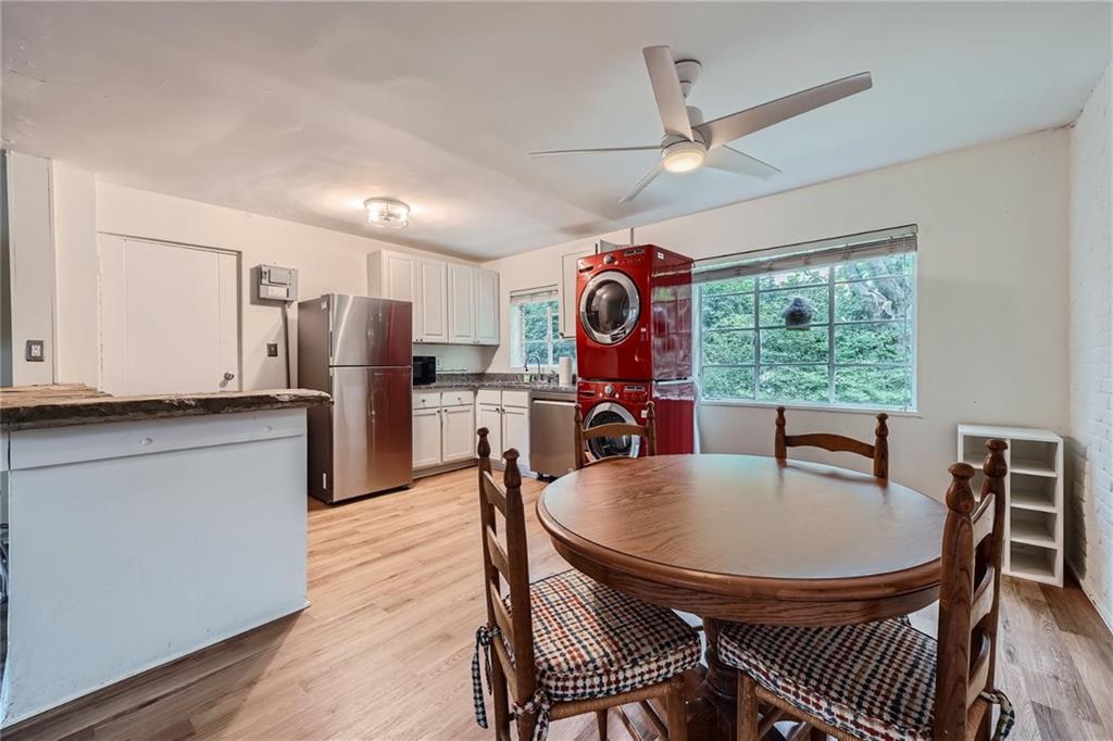 1381 Normandy Drive Northeast, Unit 2 Atlanta, GA 30306 - Photo 4 of 12 a dining room with furniture and window