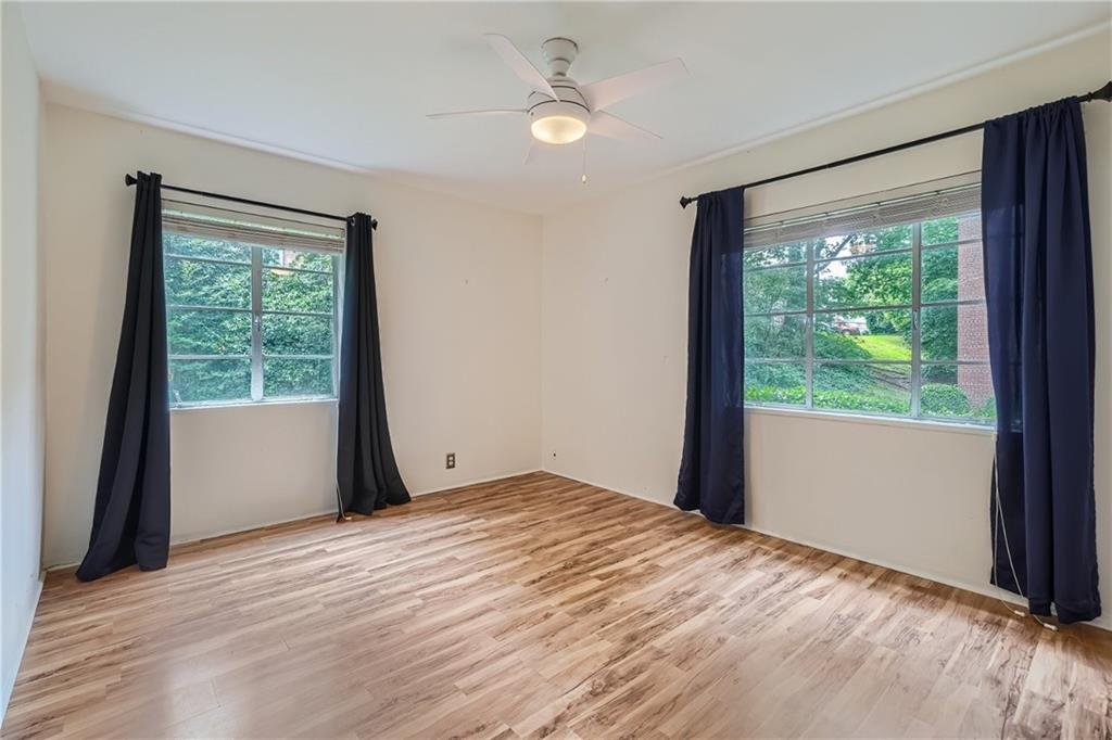 1381 Normandy Drive Northeast, Unit 2 Atlanta, GA 30306 - Photo 7 of 12 a view of an empty room with a window