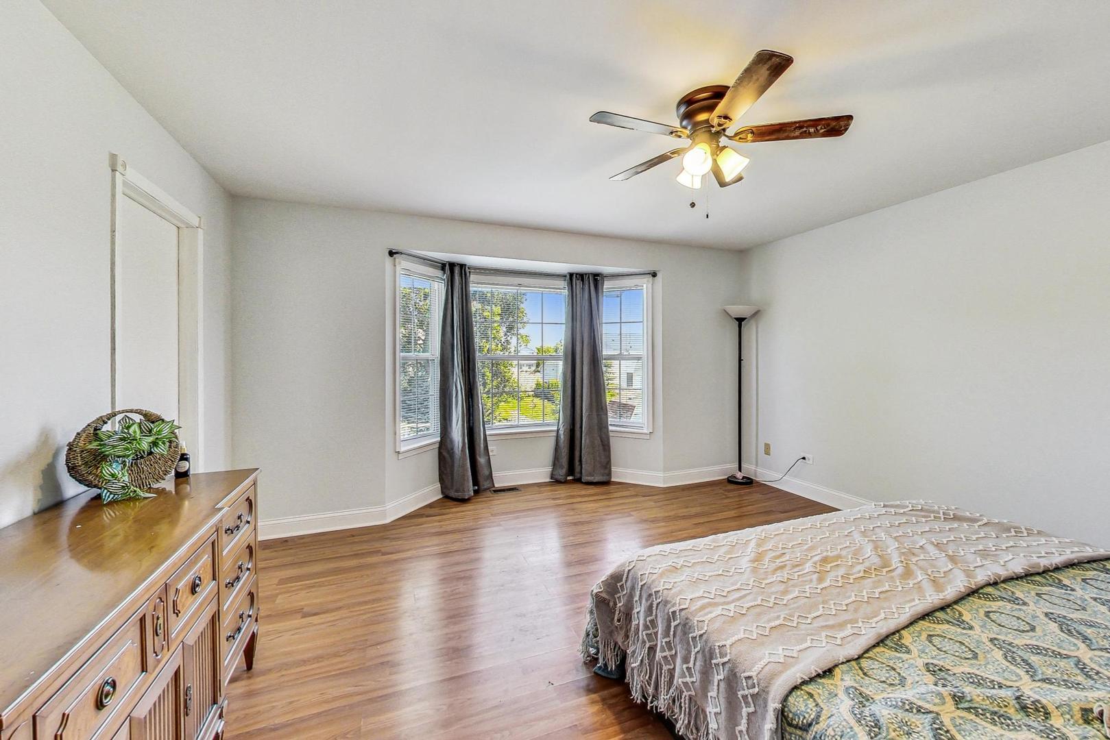 510 Porten Road Island Lake, IL 60042 - Photo 11 of 29 a bedroom with a bed and window