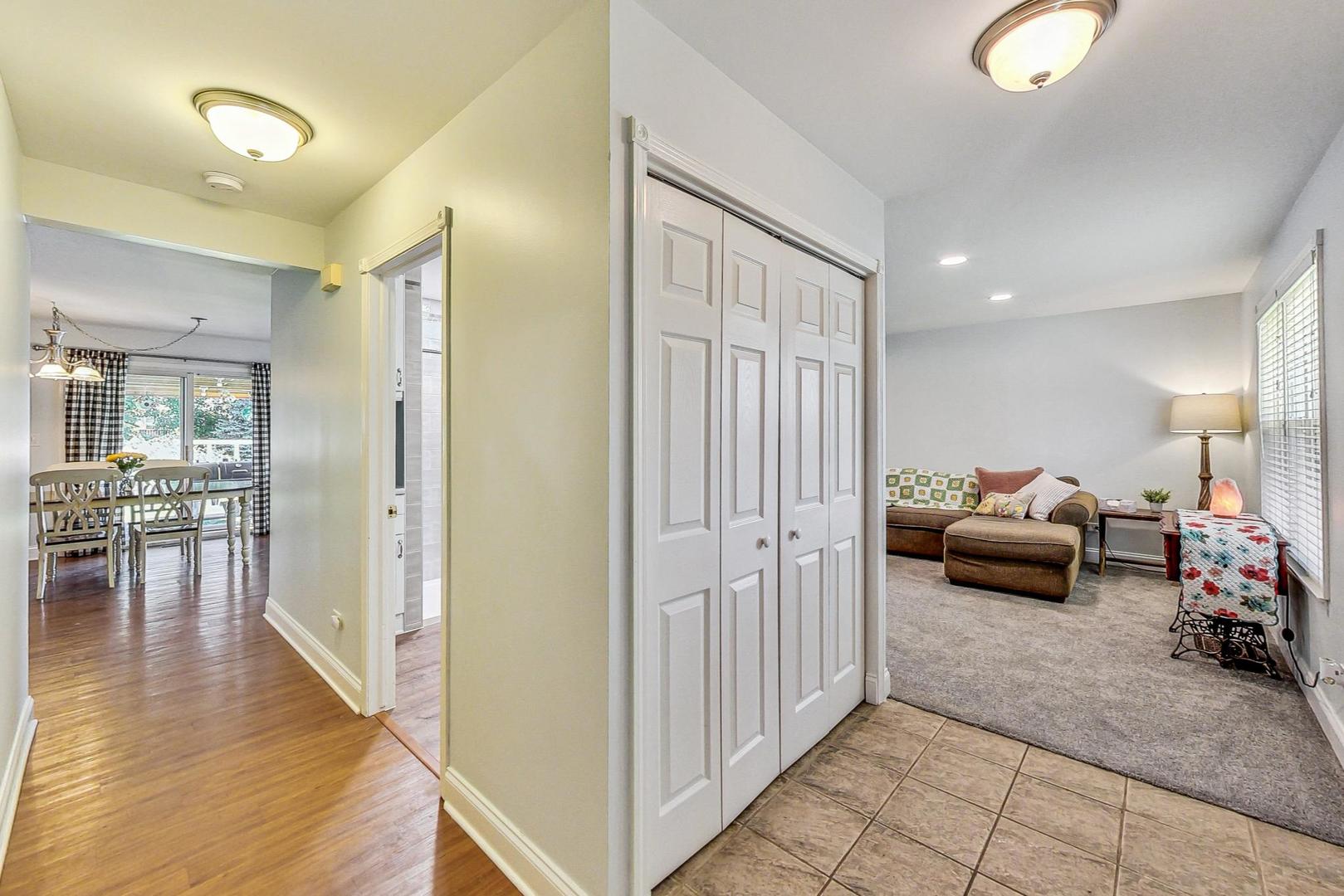 510 Porten Road Island Lake, IL 60042 - Photo 2 of 29 a living room with furniture and a wooden floor