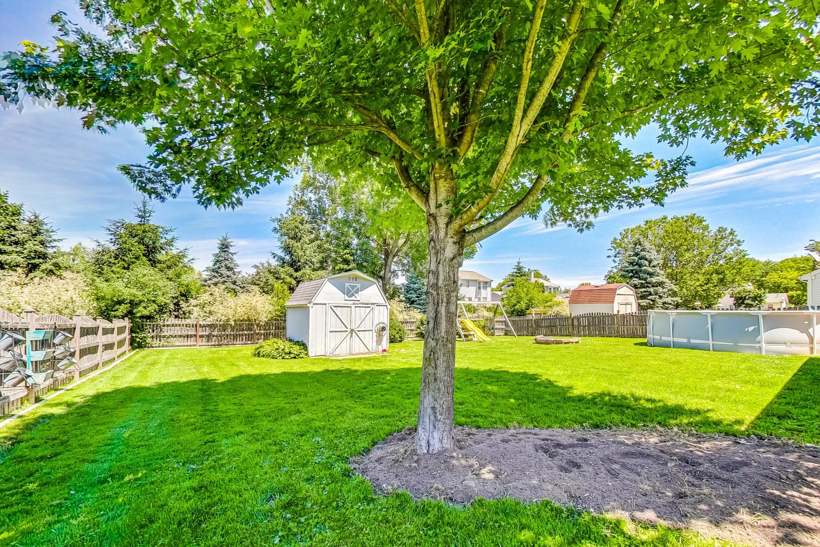 510 Porten Road Island Lake, IL 60042 - Photo 25 of 29 a view of a backyard with a garden