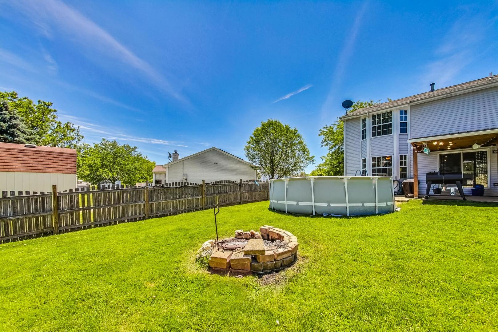 510 Porten Road Island Lake, IL 60042 - Photo 27 of 29 a view of a house with a yard and a garden