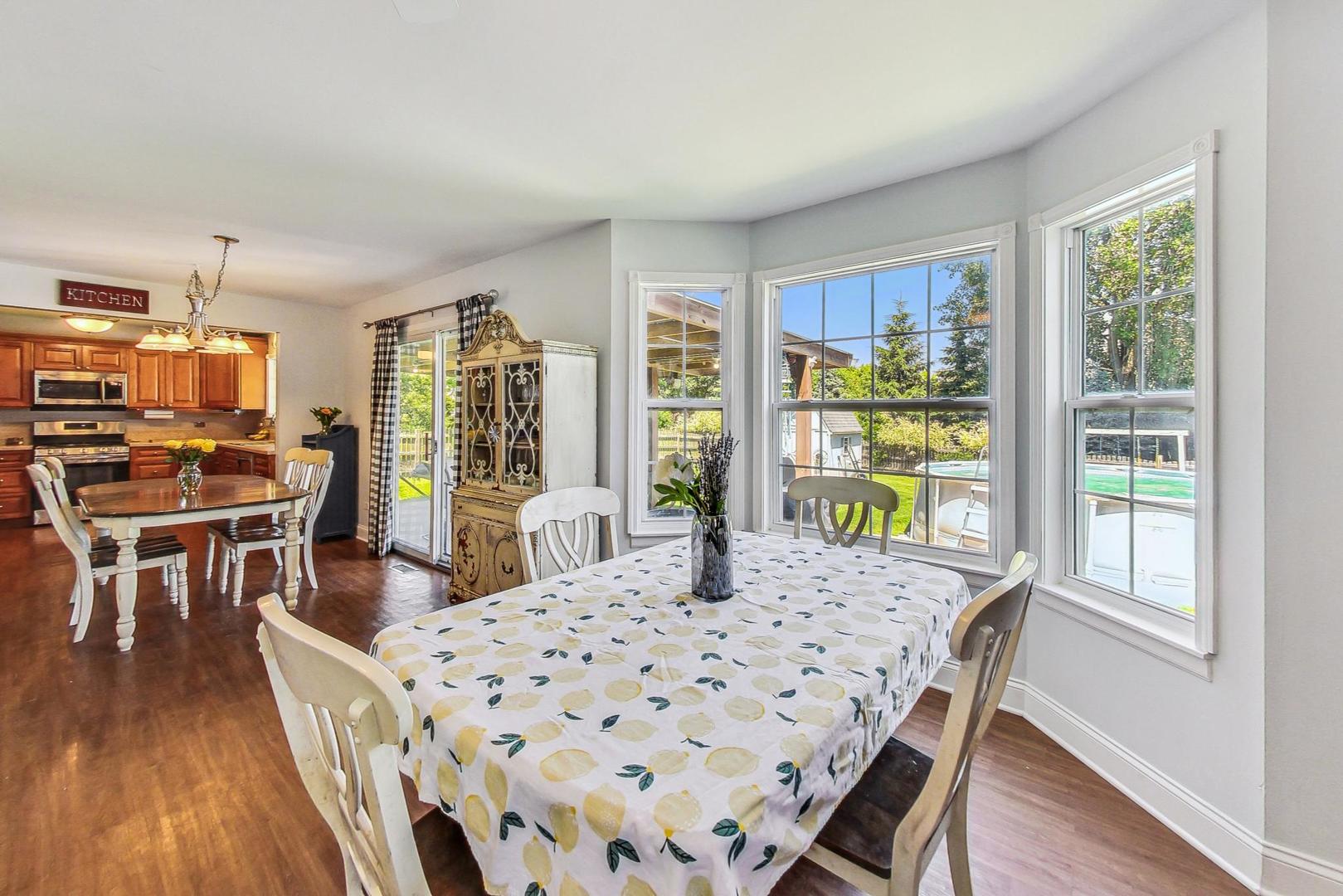 510 Porten Road Island Lake, IL 60042 - Photo 5 of 29 a view of a dining room with furniture window and outside view