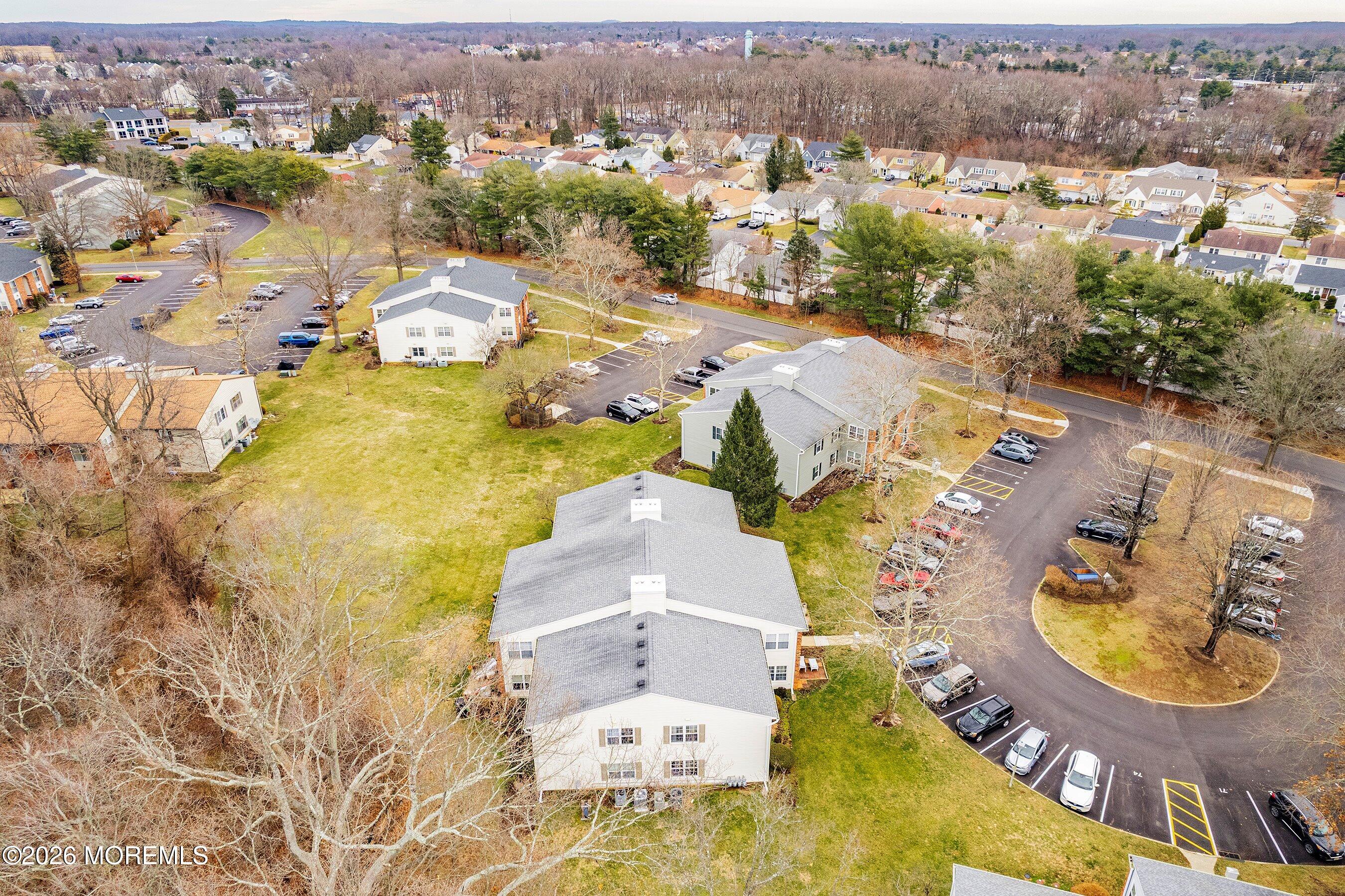 8-2 Seattle Court Freehold, NJ 07728 - Photo 26 of 35 an aerial view of residential houses with outdoor space