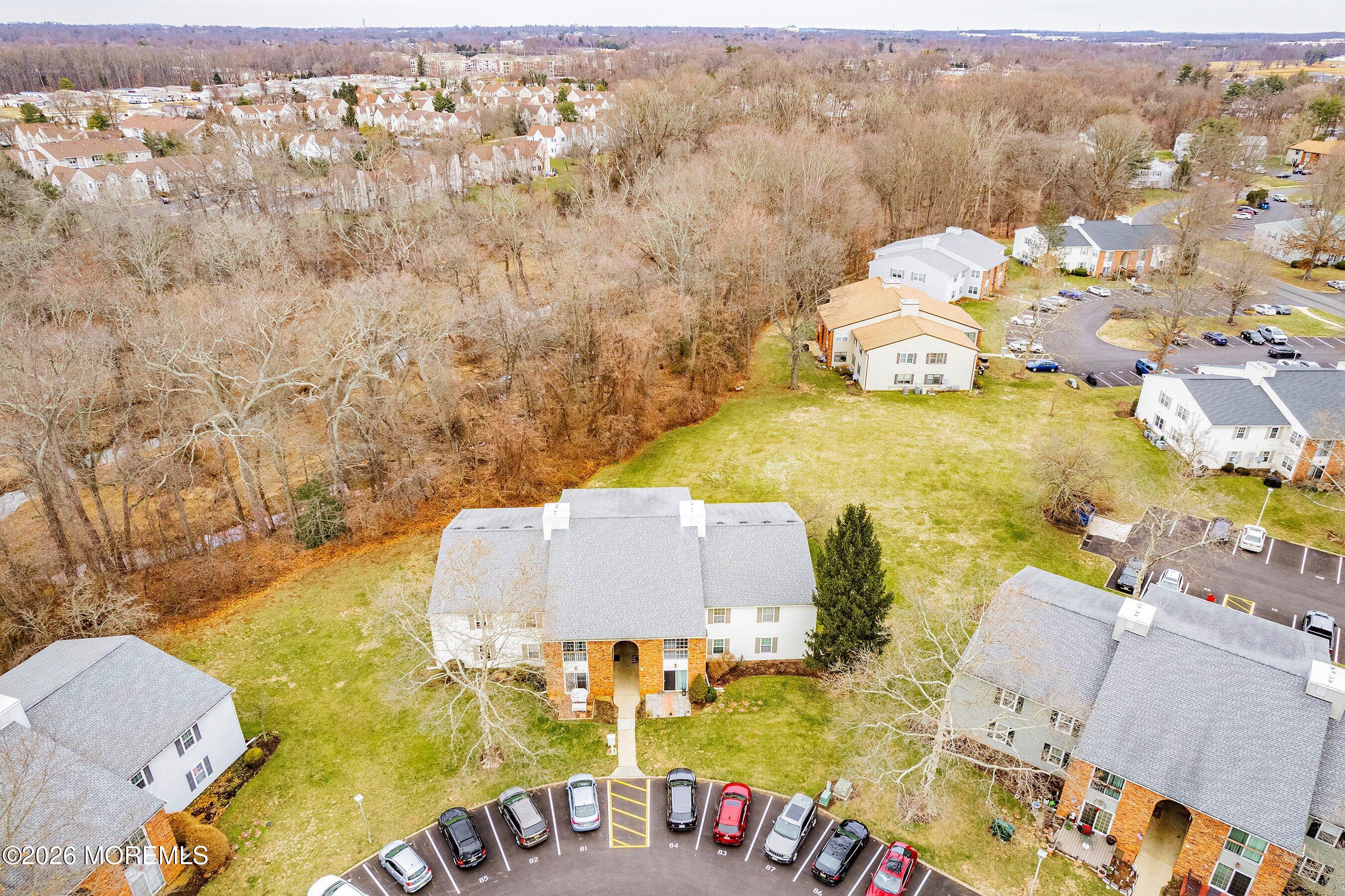 8-2 Seattle Court Freehold, NJ 07728 - Photo 28 of 35 an aerial view of residential house with pool and yard