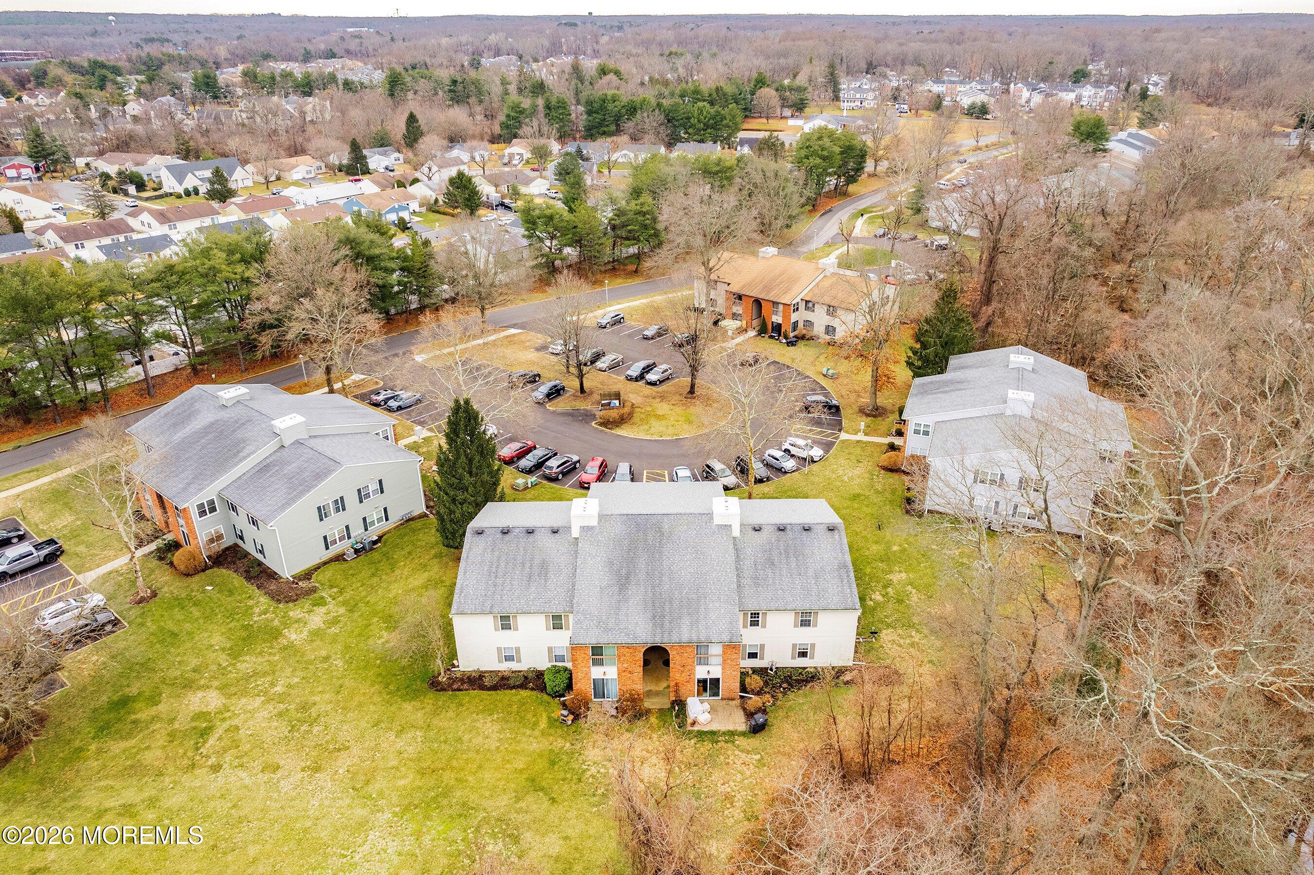8-2 Seattle Court Freehold, NJ 07728 - Photo 31 of 35 an aerial view of residential houses with outdoor space