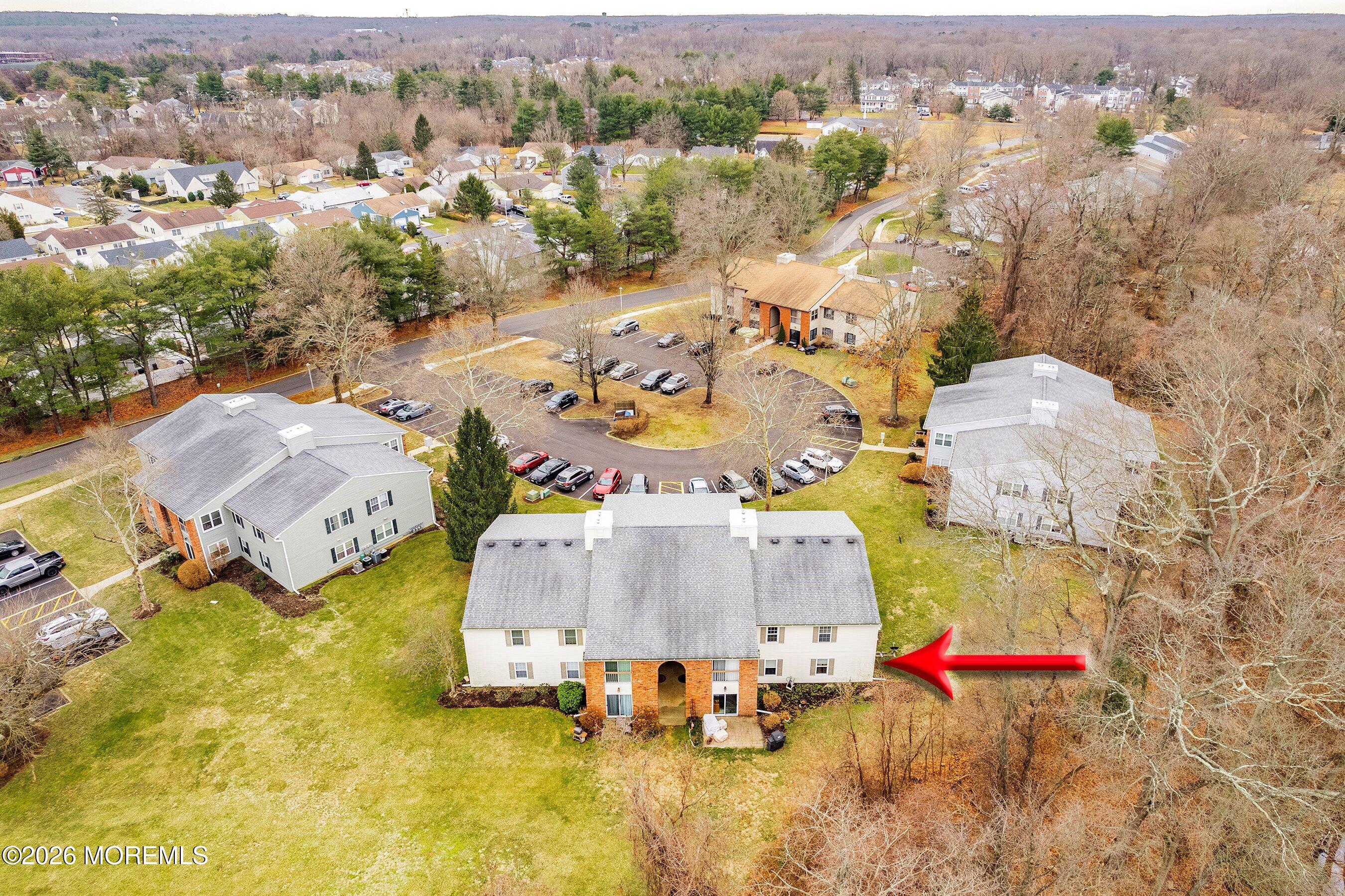 8-2 Seattle Court Freehold, NJ 07728 - Photo 32 of 35 an aerial view of residential houses with outdoor space