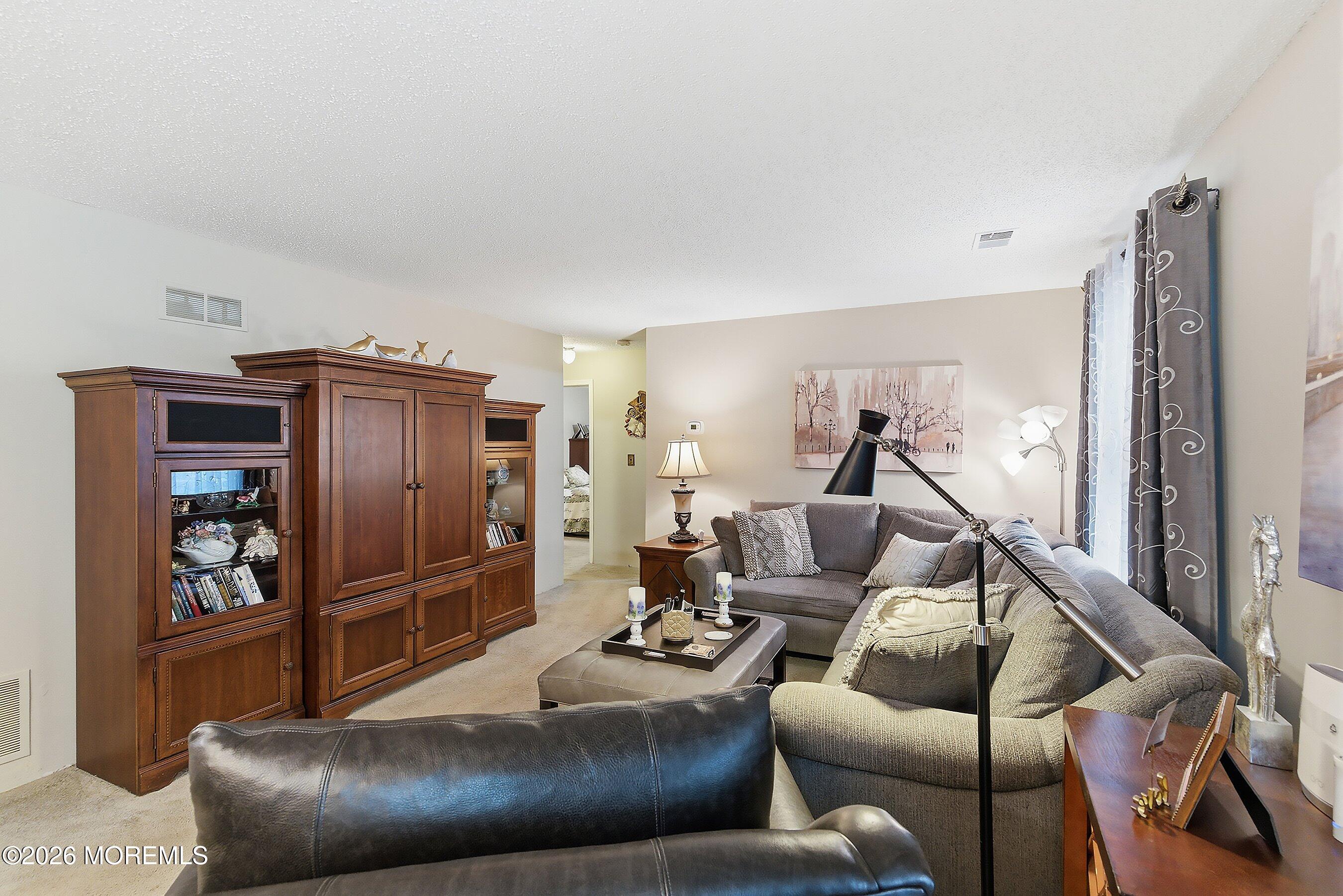 8-2 Seattle Court Freehold, NJ 07728 - Photo 8 of 35 a living room with furniture