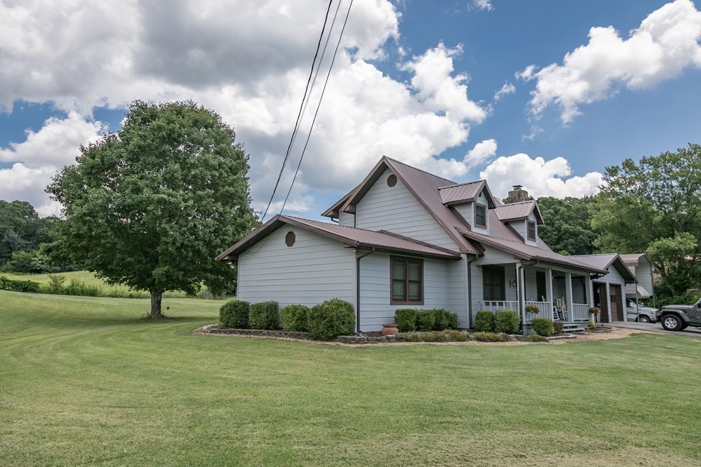 3108 Fortenberry Road Kodak, TN 37764 - Photo 45 of 47 a front view of a house with garden