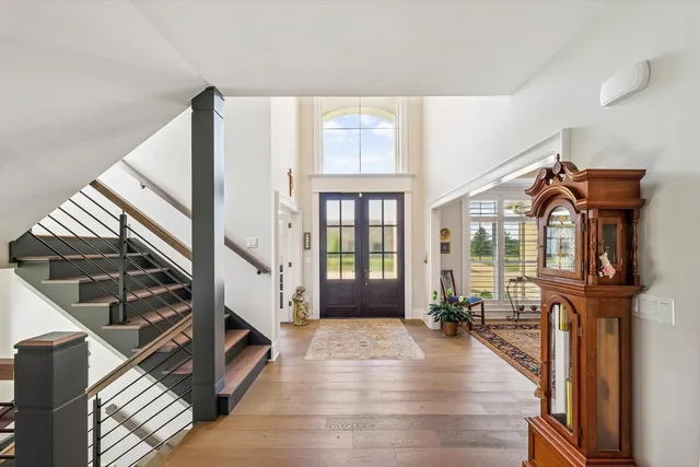 a open kitchen with lots of counter space a sink appliances and dining table