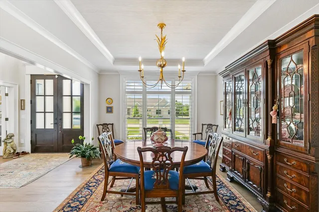 a bed room with a bed and a chair