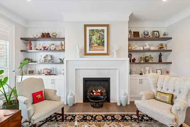 a white bath tub sitting next to a white sink