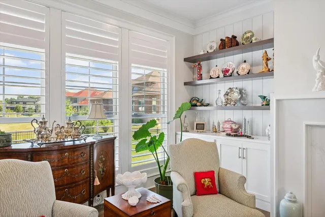 a view of walk in closet with clothes