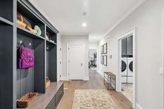 an aerial view of a house with a swimming pool yard and outdoor seating