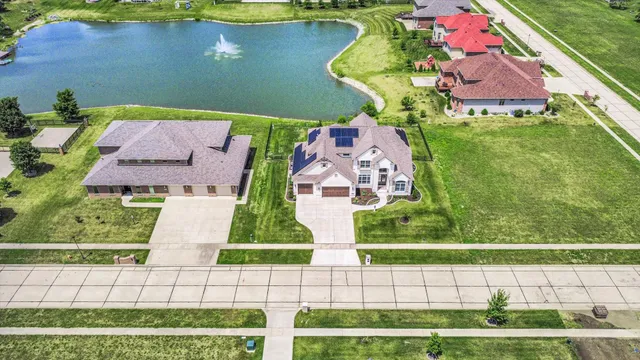 a living room with furniture cabinets and window