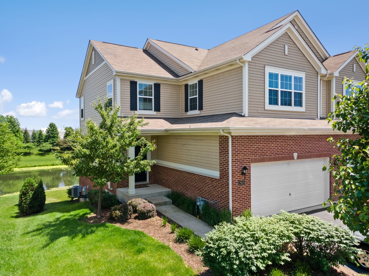 2919 Church Road Aurora, IL 60502 - Photo 1 of 28 a front view of a house with a yard