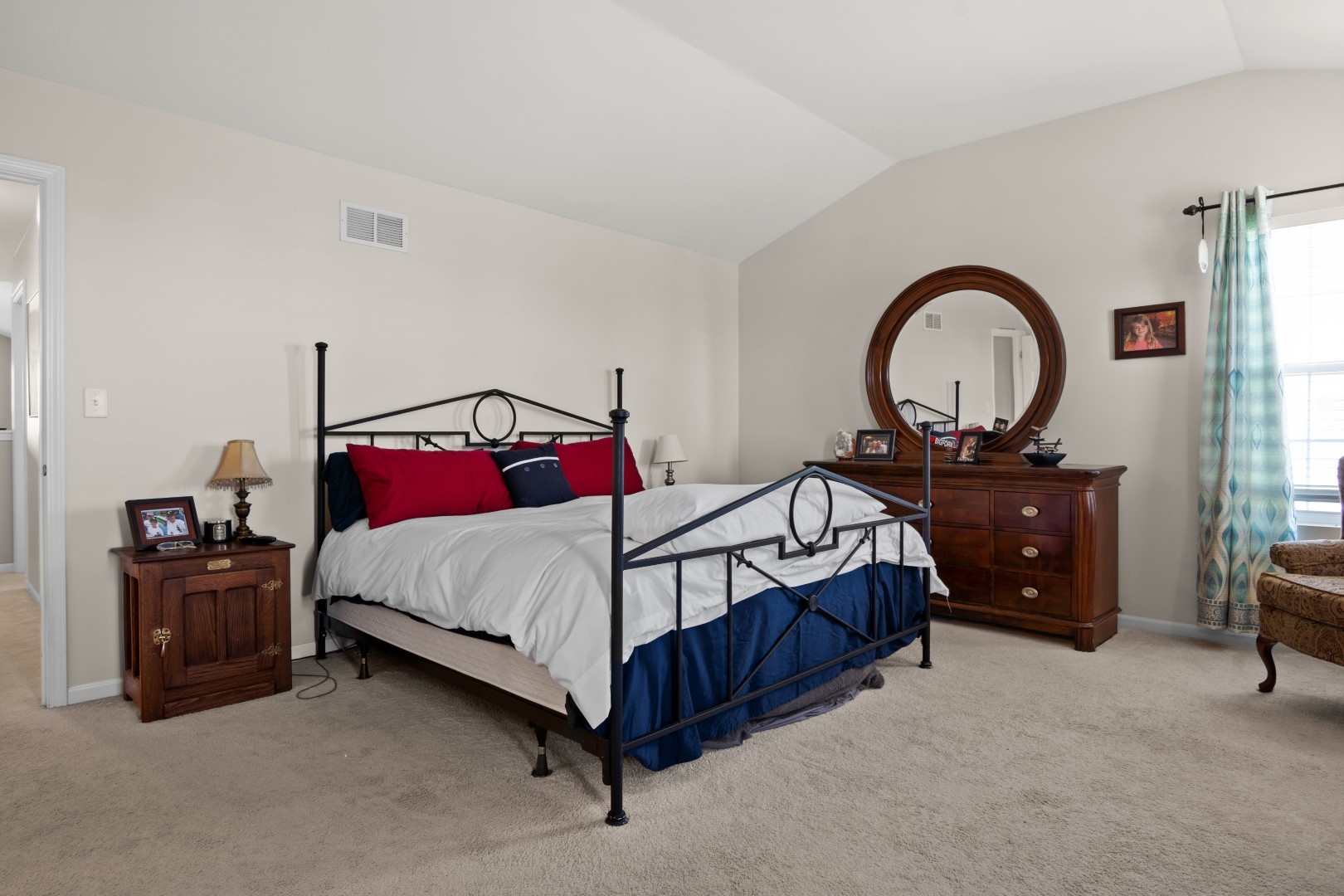 2919 Church Road Aurora, IL 60502 - Photo 17 of 28 a bed room with a bed and a dresser