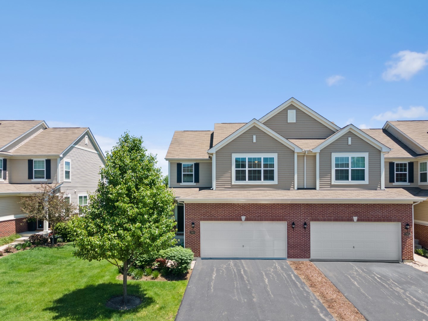 2919 Church Road Aurora, IL 60502 - Photo 2 of 28 a front view of a house with a yard