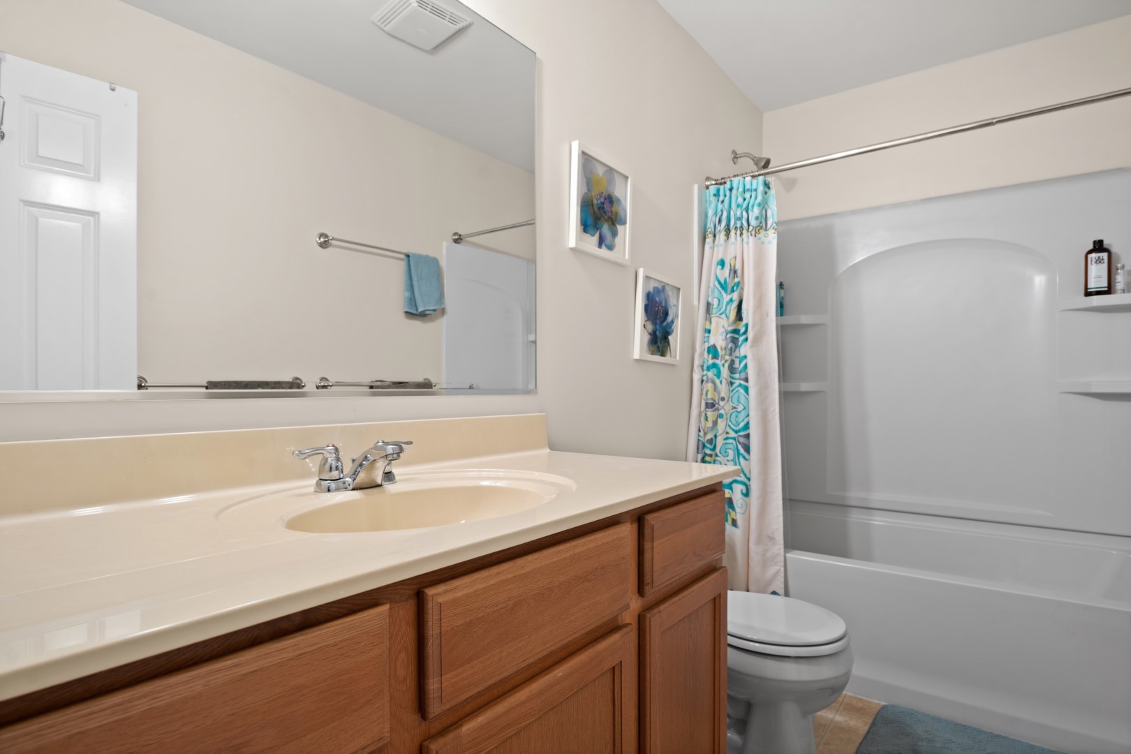 2919 Church Road Aurora, IL 60502 - Photo 21 of 28 a bathroom with a sink toilet and shower