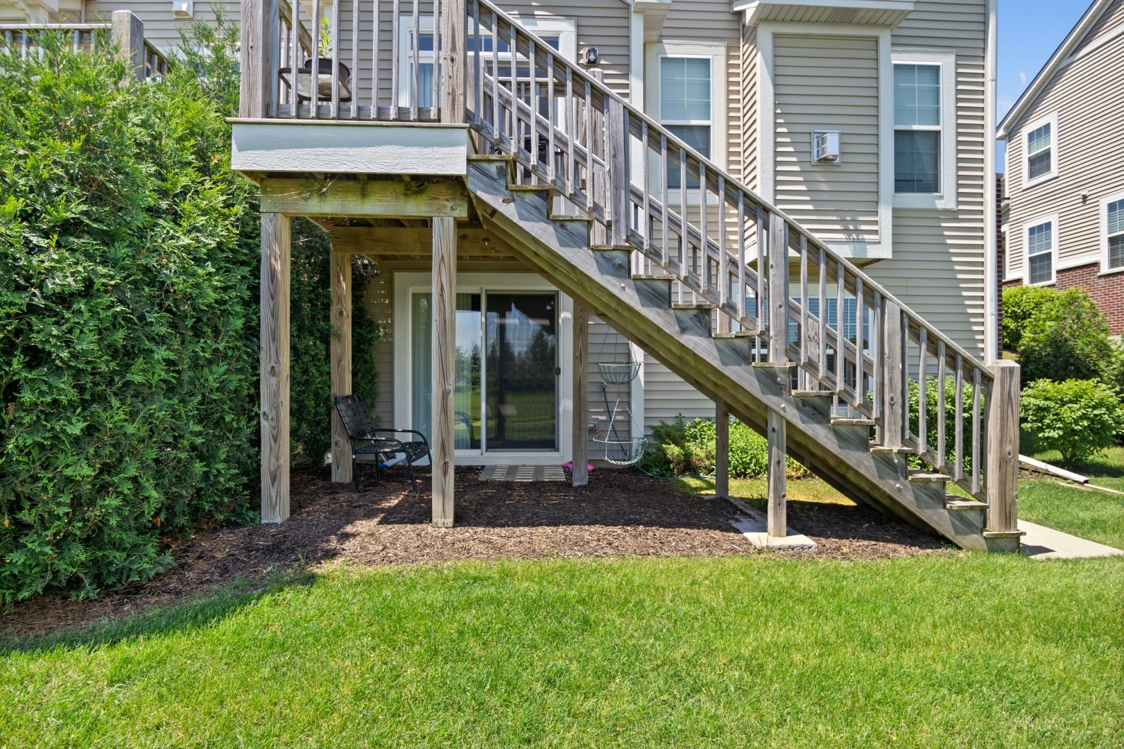 2919 Church Road Aurora, IL 60502 - Photo 22 of 28 a view of an house with wooden deck and a backyard
