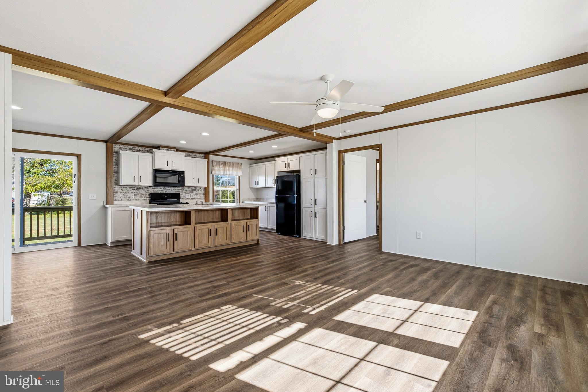 343 Park Road Stanley, VA 22851 - Photo 19 of 48 a view of kitchen with stainless steel appliances wooden floor and large windows