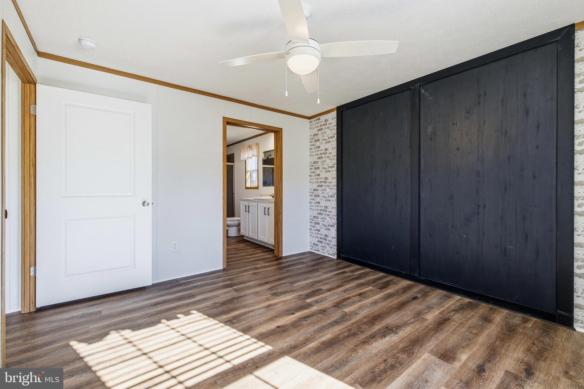 343 Park Road Stanley, VA 22851 - Photo 23 of 48 a view of a bedroom with wooden floor and closet