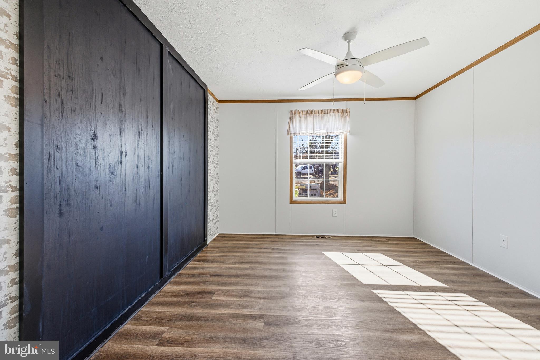 343 Park Road Stanley, VA 22851 - Photo 24 of 48 an empty room with windows and fan