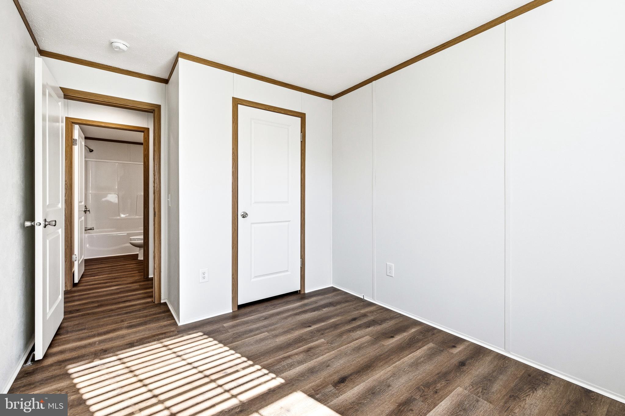 343 Park Road Stanley, VA 22851 - Photo 33 of 48 a view of a room with wooden floor and a bathroom