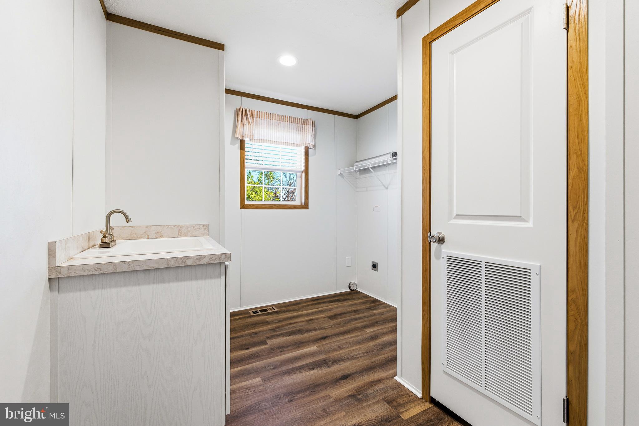 343 Park Road Stanley, VA 22851 - Photo 36 of 48 a bathroom with a sink and a mirror