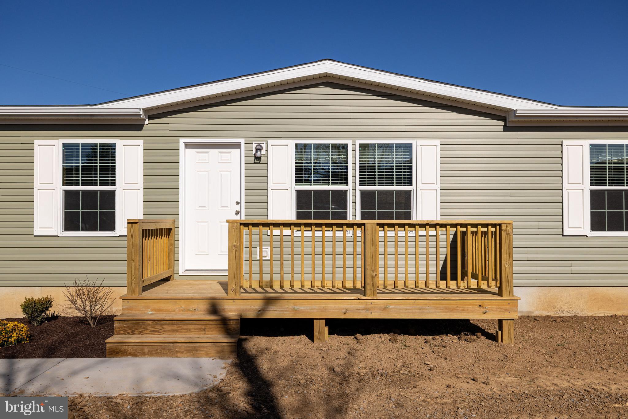343 Park Road Stanley, VA 22851 - Photo 40 of 48 a front view of a house with a wooden fence